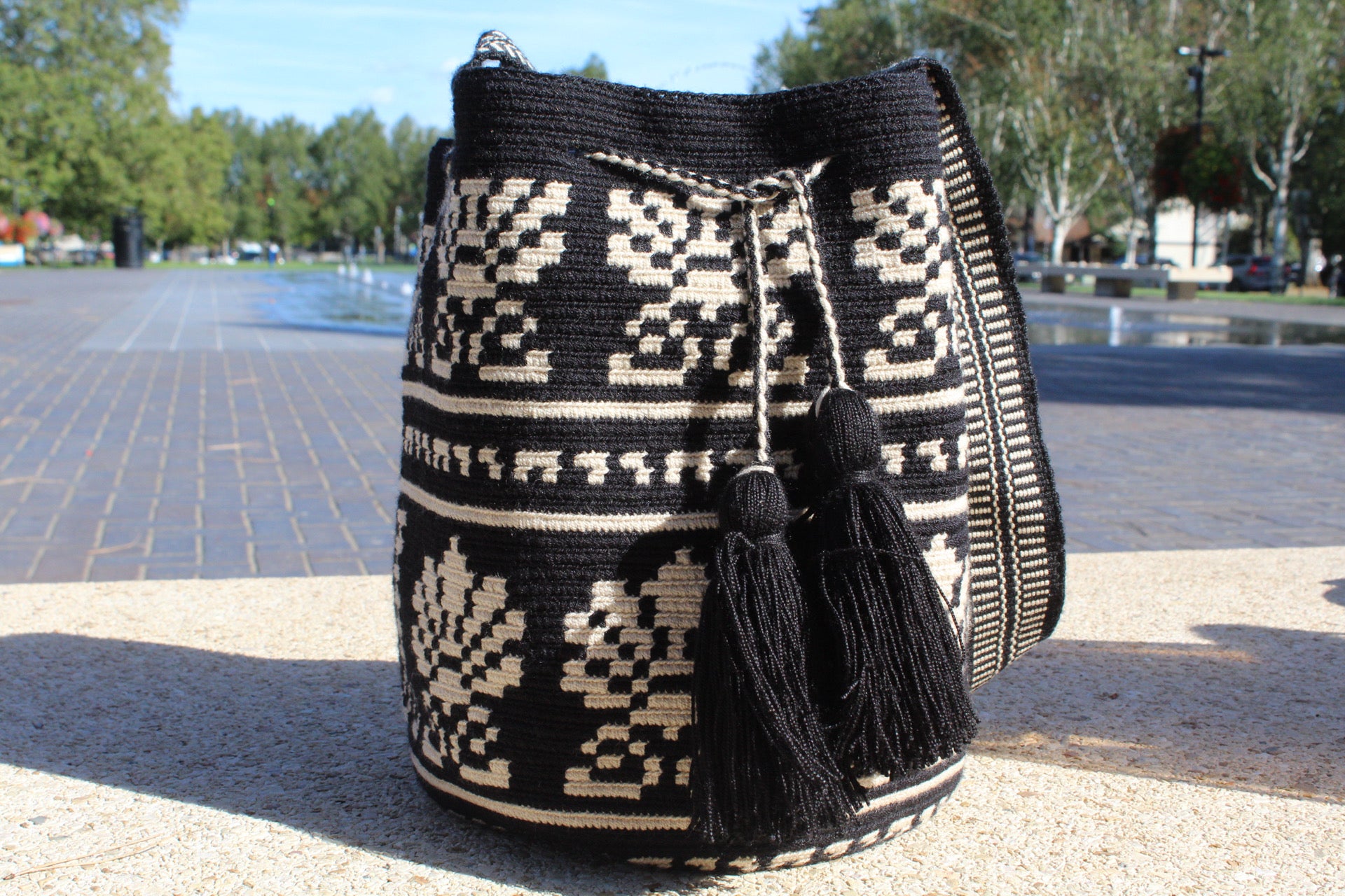 front facing view of our mochila mediana in black & cream